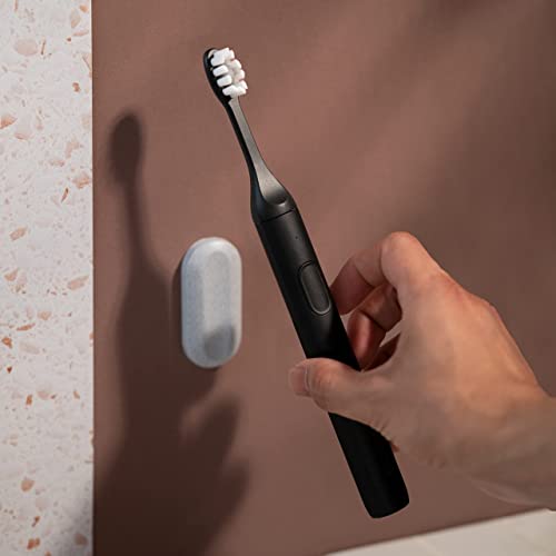 - SURI Sustainable Sonic Toothbrush | Slim and Powerful Electric Toothbrush | Recyclable Plant-Based Head | 2 Modes | Waterproof | Charging Stand | Midnight Black -