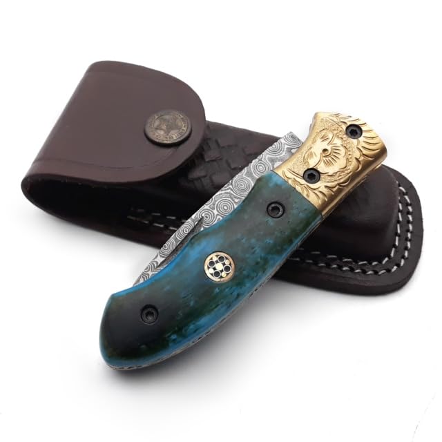 Dessi Handmade damascus steel blade folding knife. Blade length under 3 inches. Legal to carry.1644
