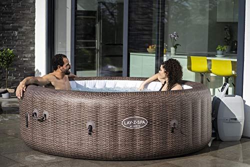 - Lay-Z-Spa St Moritz Hot Tub | 180 AirJet Massage System | Rattan Design | Inflatable Spa with Freeze Shield | 5-7 Person -