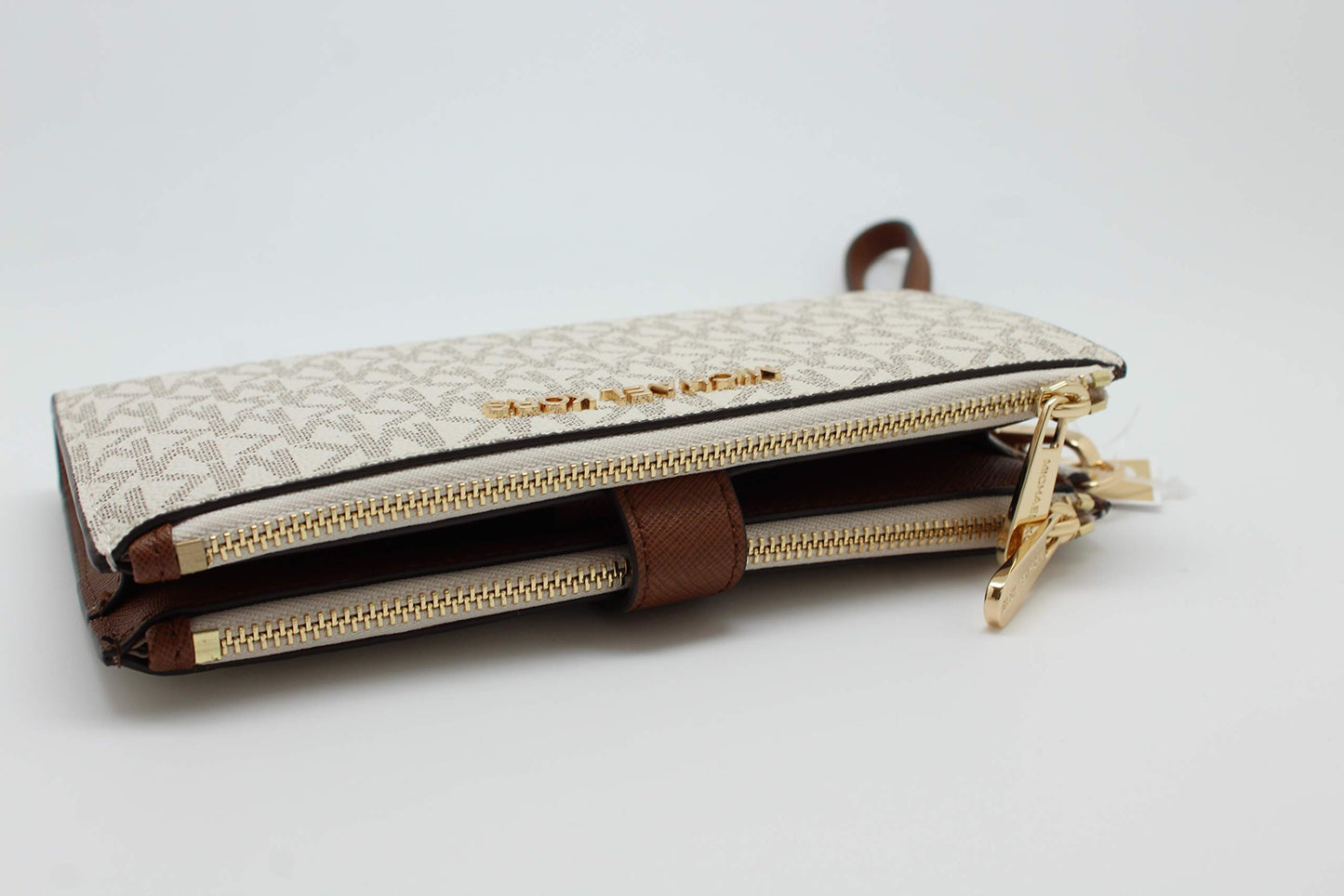 - Michael Kors Jet Set Travel Double Zip Wristlet -