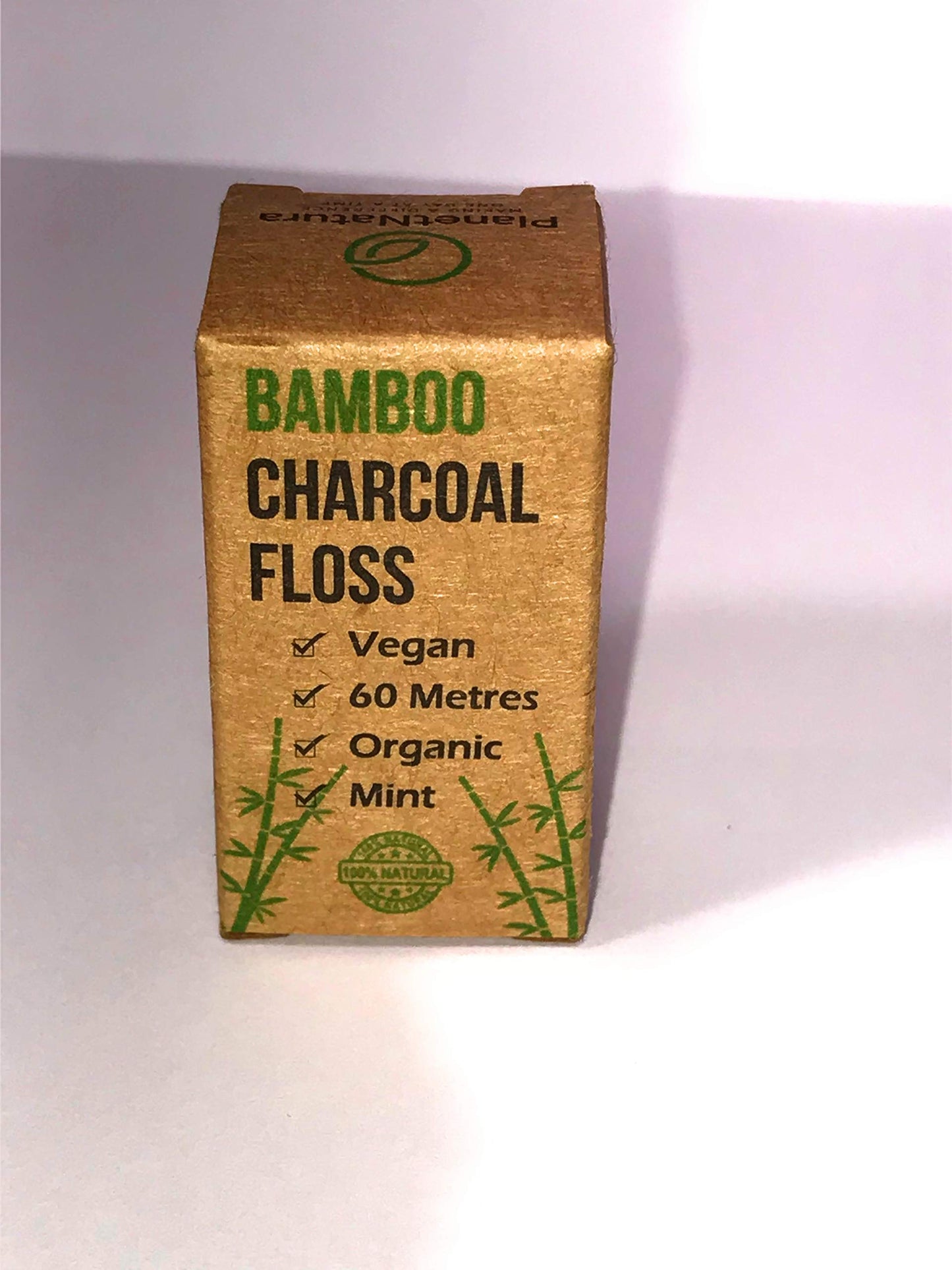 - PlanetNatura Bamboo Dental Floss with Activated Charcoal –