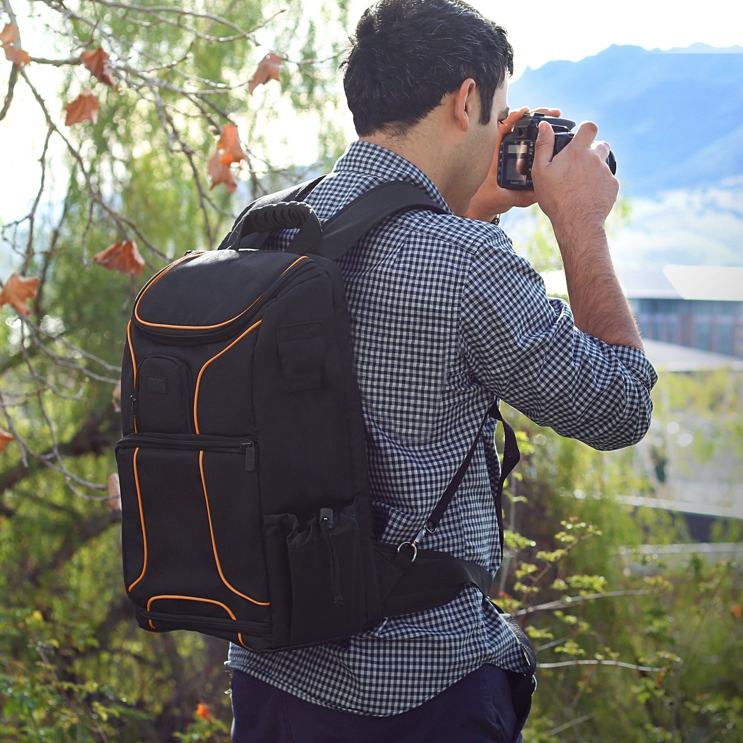 - USA Gear Digital Camera Backpack DSLR Photo Bag with Comfort Design, Waterproof Cover -