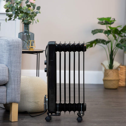 - Russell Hobbs 1500W/1.5KW Oil Filled Radiator | 7 Fin Portable Electric Heater -